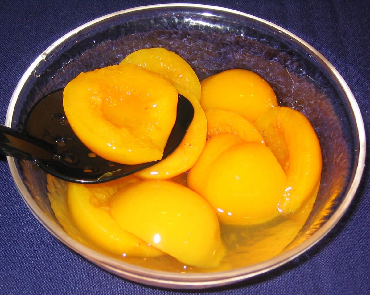 bowl of peaches cut in half